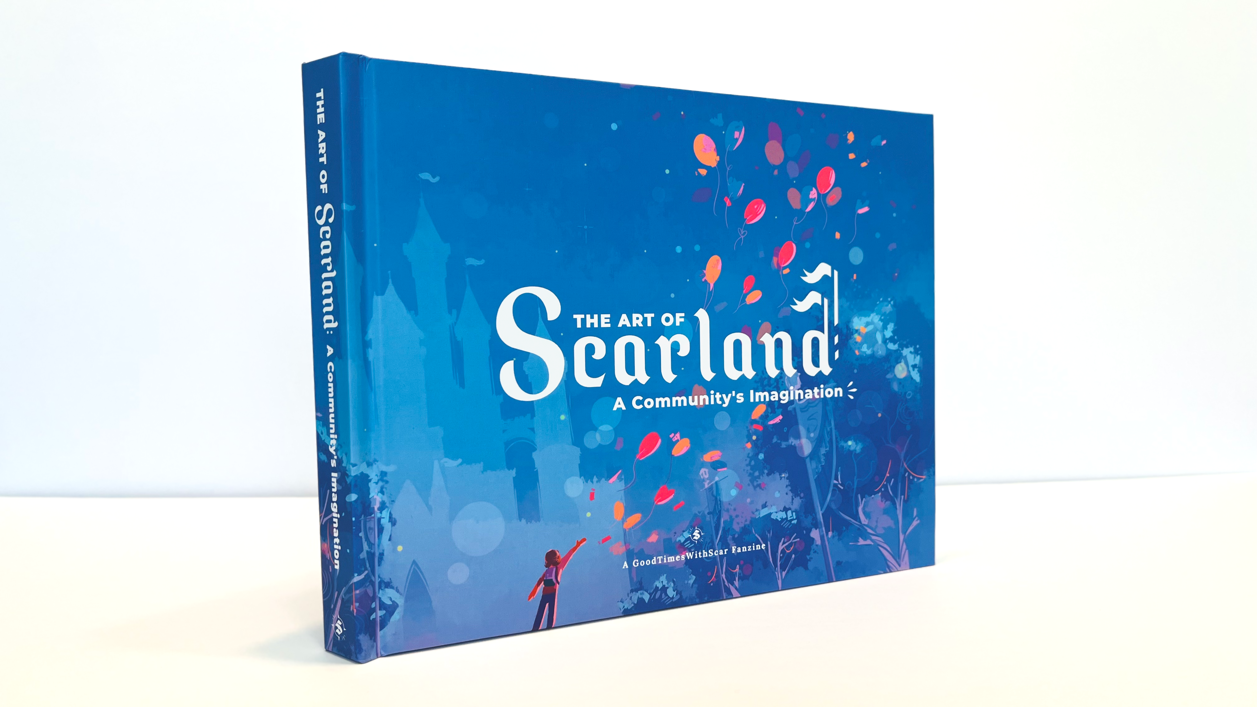The Scarland Artbook on a white surface with a white background. It is stood such that the front and spine are visible.